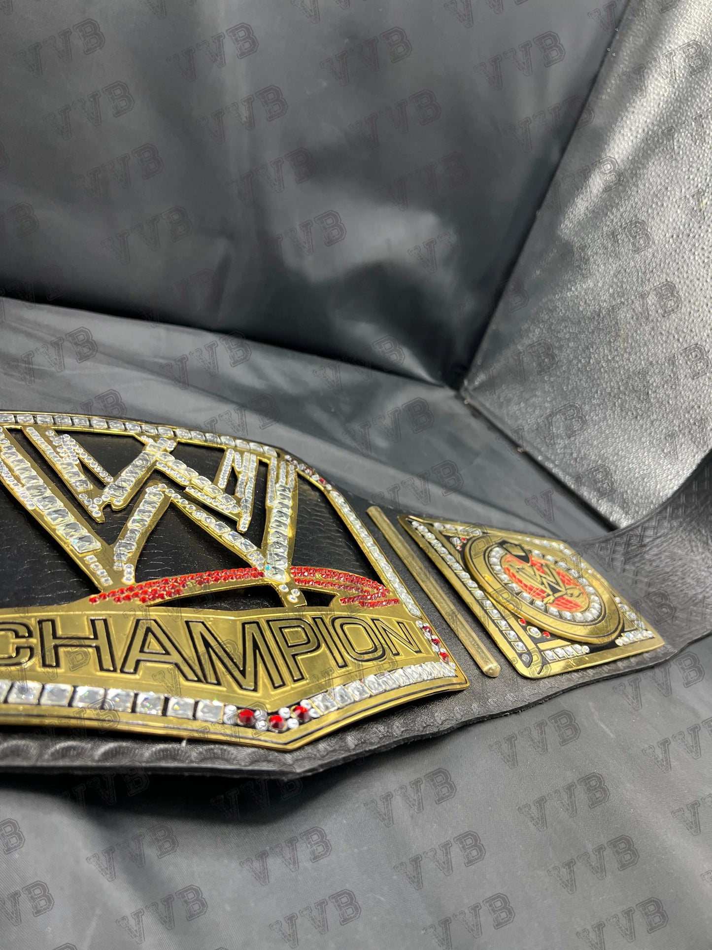 High-quality wrestling title belt displayed prominently the rock