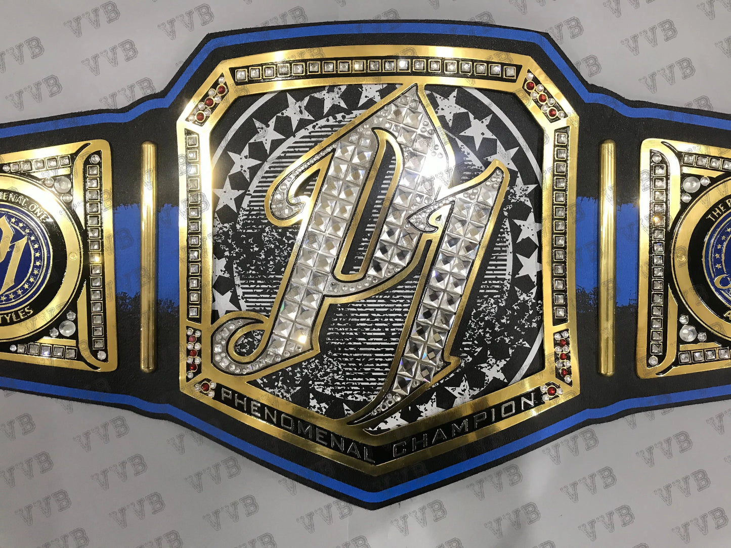Decorative belt with a prominent emblem on a gray background