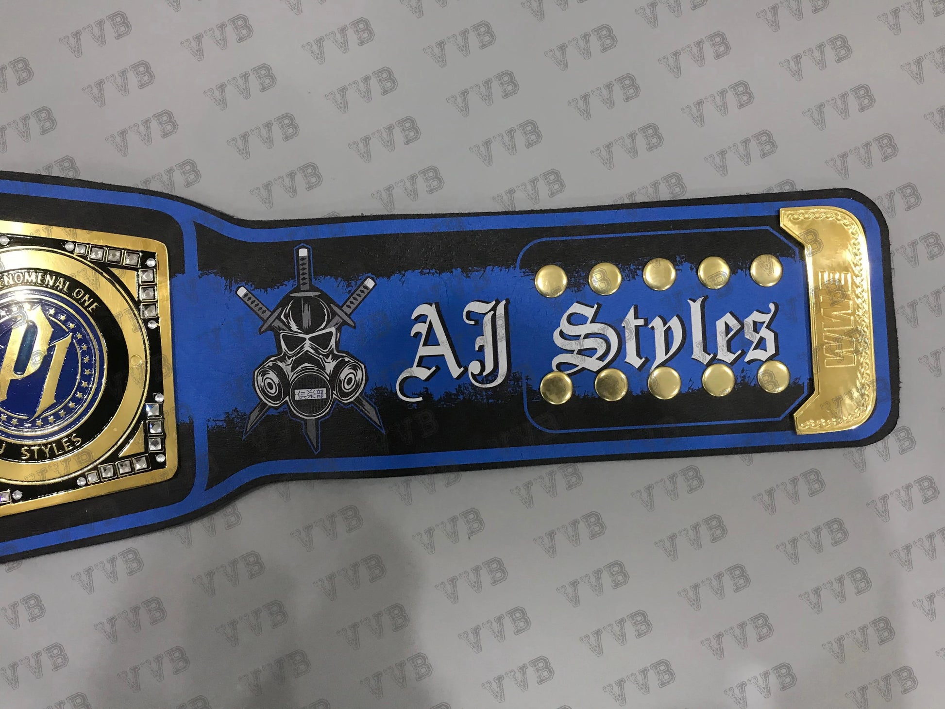 championship belt with 'YTB' branding on a gray background