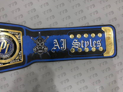 championship belt with 'YTB' branding on a gray background