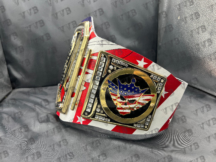 Detail shot of the thick diecast plates and ornate engraving on the Cody Rhodes championship belt.