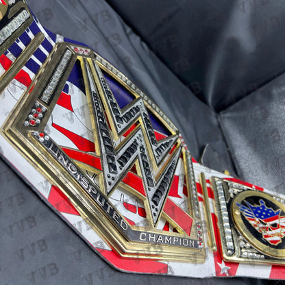 Full belt laid flat displaying the white leather strap and intricate multi-colored design